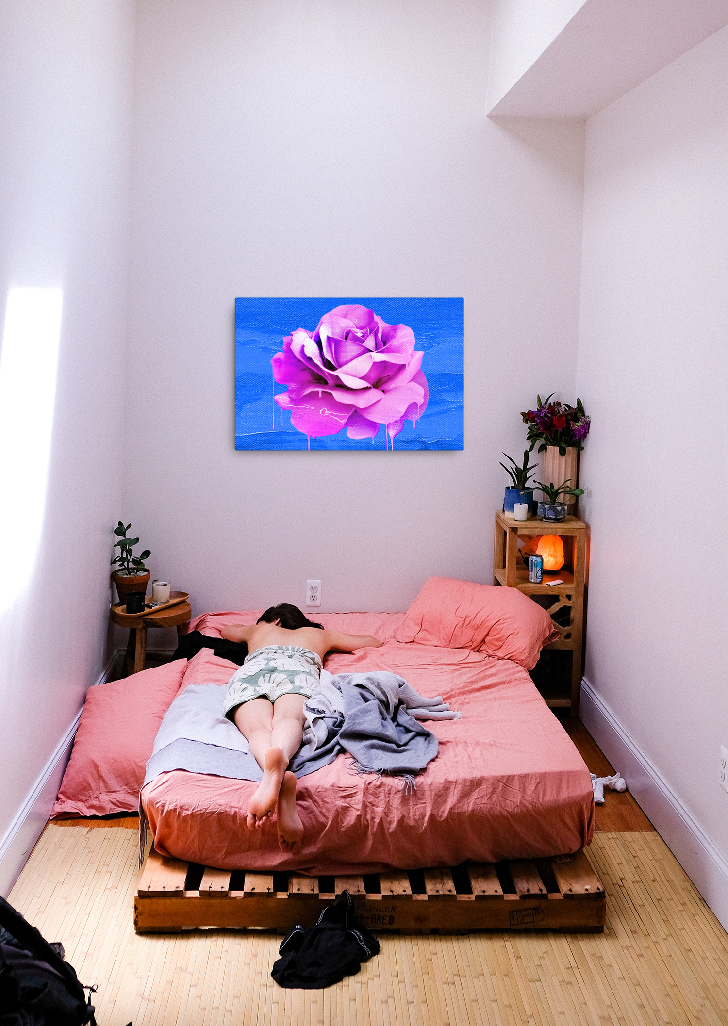 Beautifully Crushed Petals is a canvas wall art with a beautiful pink melting rose covering the majority of the image against a sky blue canvas textured background.