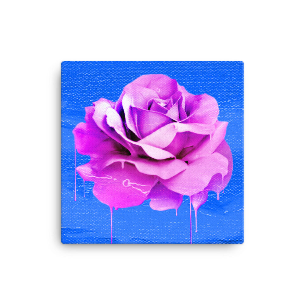 Beautifully Crushed Petals is a canvas wall art with a beautiful pink melting rose covering the majority of the image against a sky blue canvas textured background.