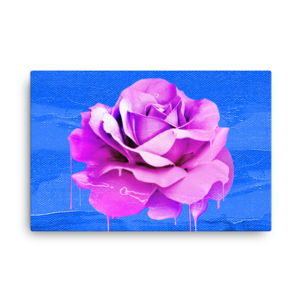 Beautifully Crushed Petals is a canvas wall art with a beautiful pink melting rose covering the majority of the image against a sky blue canvas textured background.